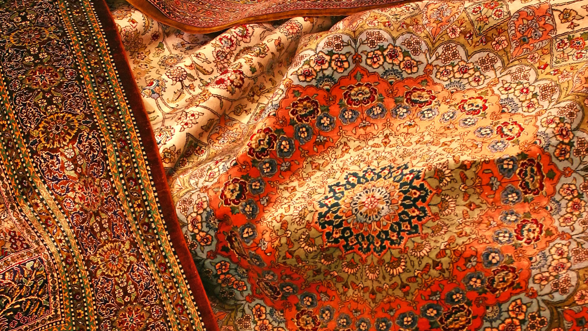 Close-up of a red and gold Persian rug