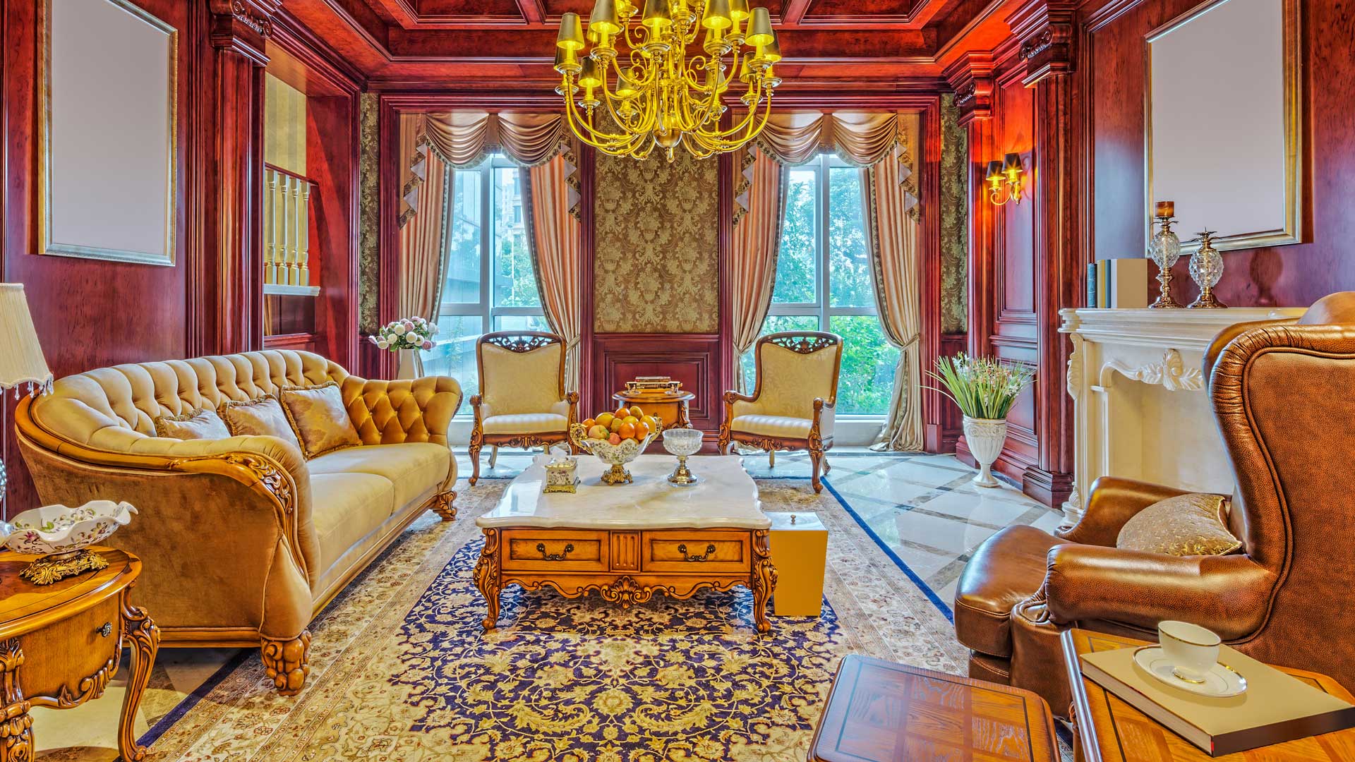 A living room with a large patterned area rug under a white sofa